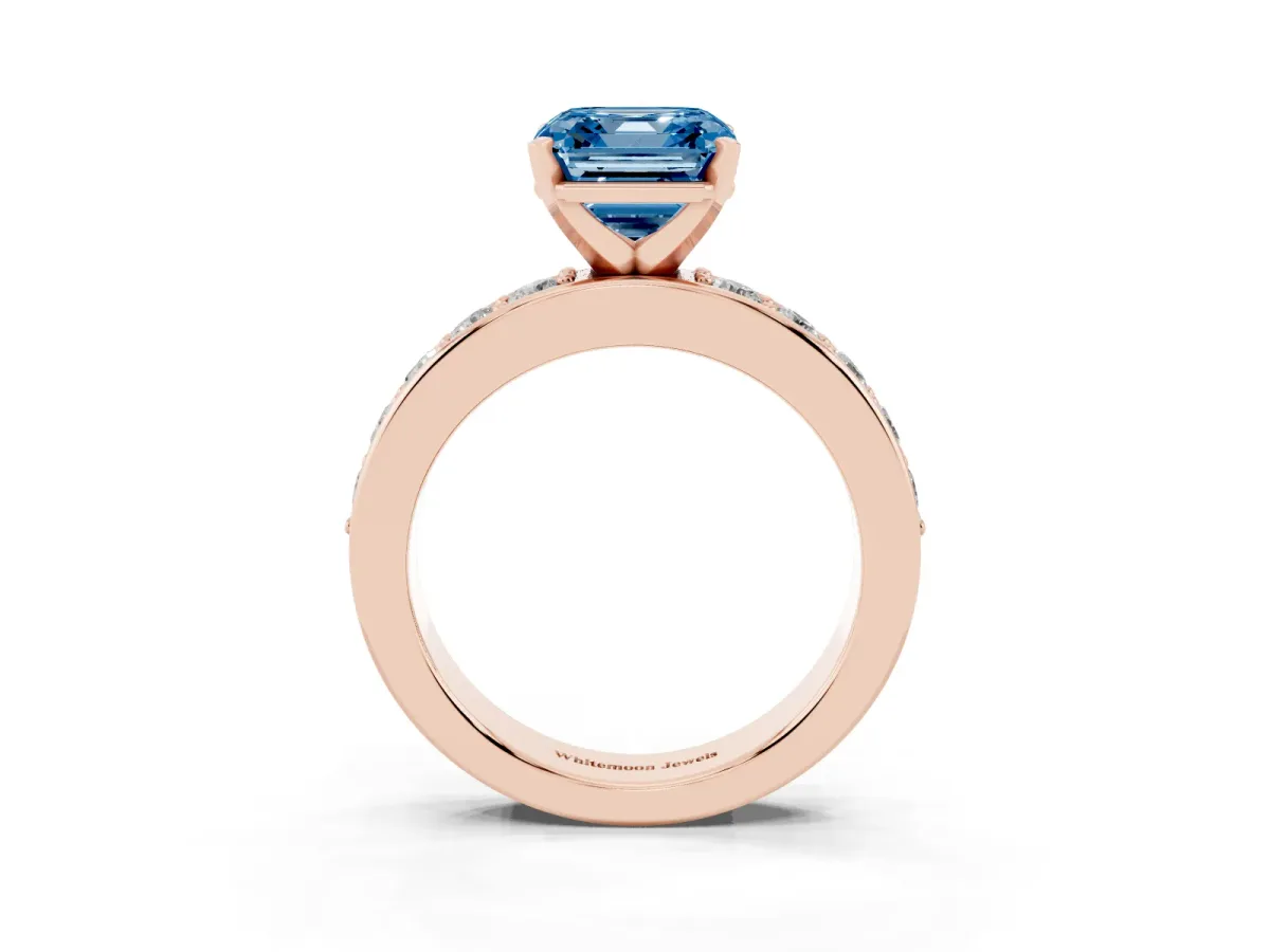 Fancy Blue Asscher Cut Diamond Engagement Ring with Channel Set Round Band and Prong Setting Rose gold