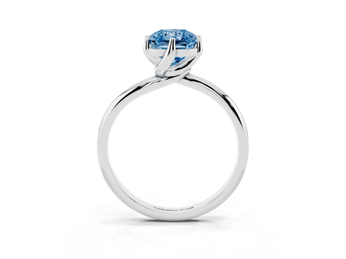 Fancy Blue Radiant Cut Diamond Solitaire Engagement Ring with Four-Prong Setting and Classic Band Silver