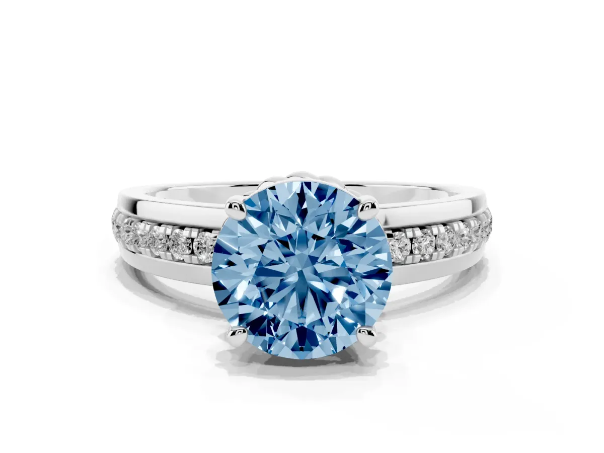 Fancy Blue Round Cut Solitaire Diamond Ring with Channel Set Band and Six-Prong Setting Silver