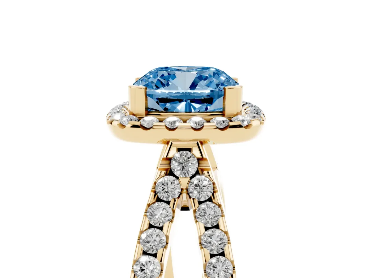 Fancy Blue Cushion Cut Diamond Halo Ring with Split Shank Pavé Band and Prong Setting Yellow gold