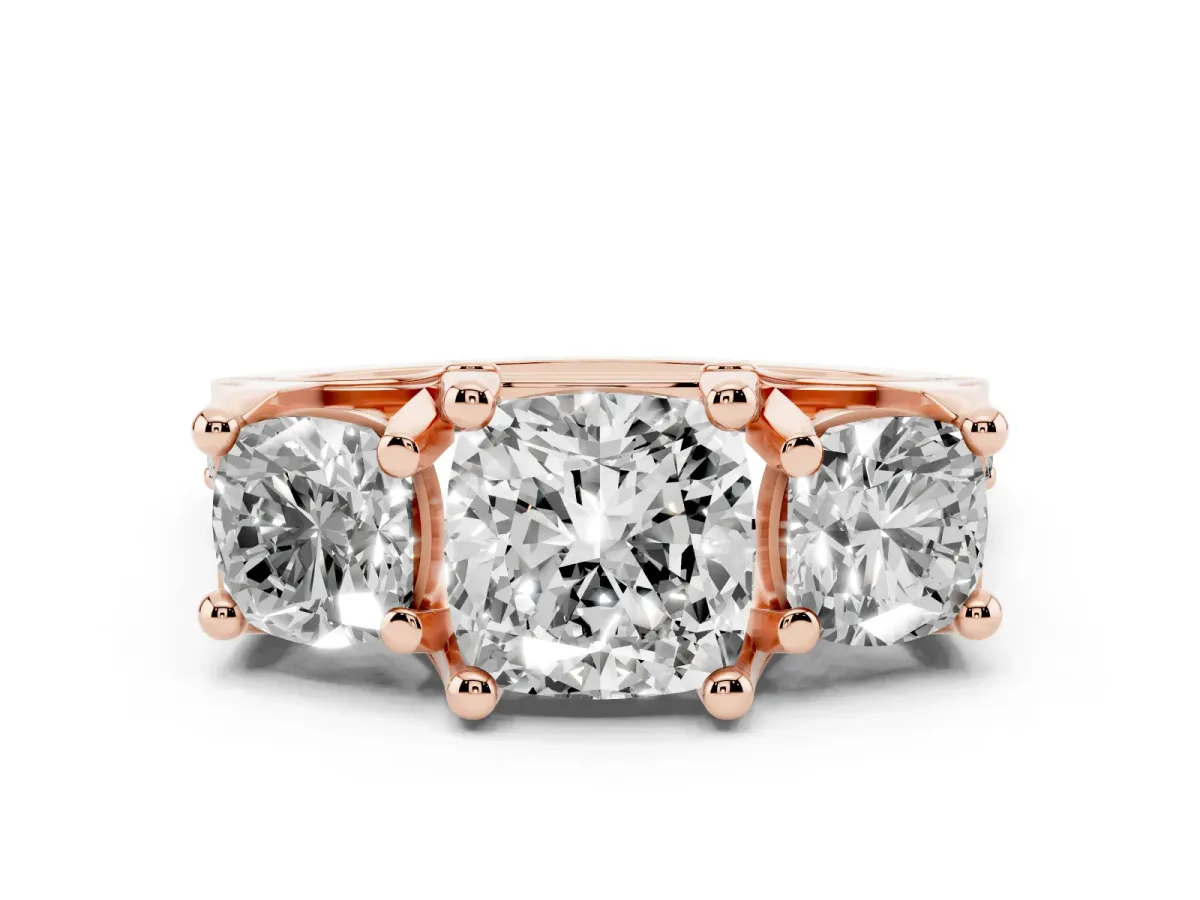 Cushion Cut Diamond Three-Stone Ring with Channel Set Band and Four-Prong Setting Rose gold