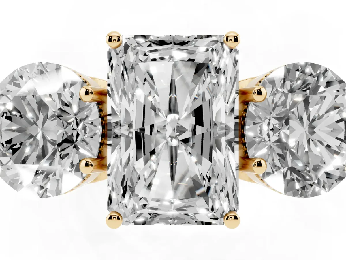 Three-Stone Radiant Cut Diamond Engagement Ring with Prong Setting on a Classic Band Yellow gold