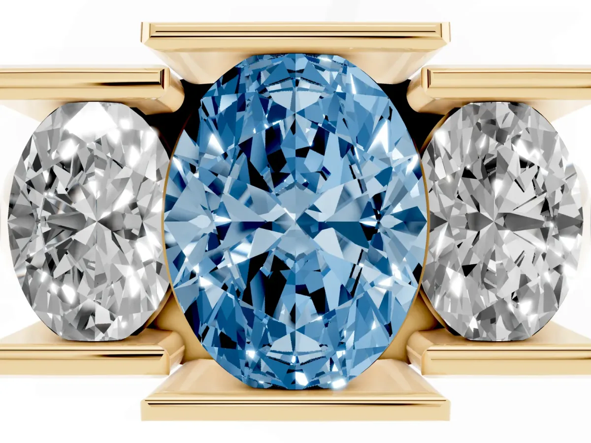 Fancy Blue Three Stone Oval Cut Cut Channel Set Diamond Ring Yellow gold