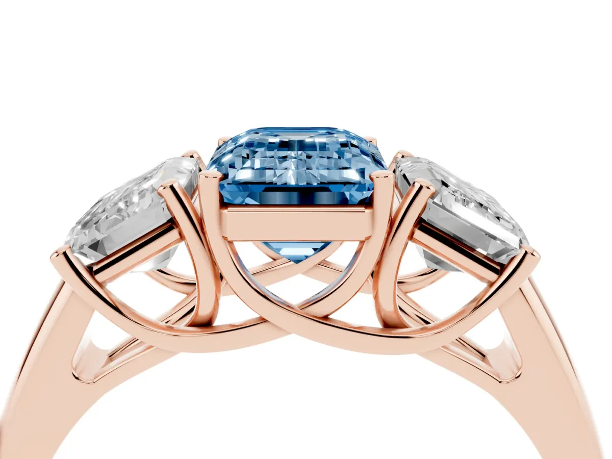 Fancy Blue Three-Stone Emerald Cut Diamond Engagement Ring with Prong Setting Rose gold