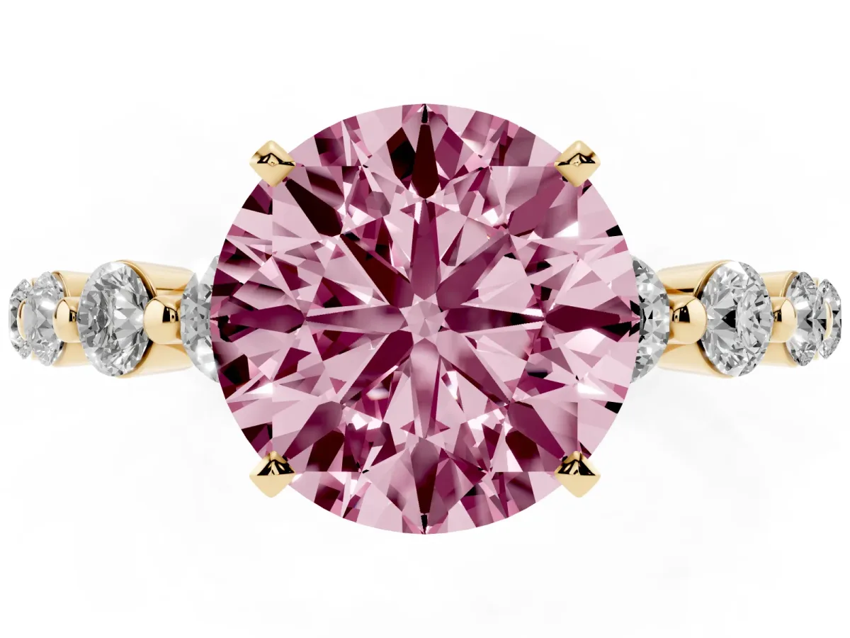 Fancy Pink Round Cut Solitaire Diamond Ring with Pave Band and Four-Prong Setting Yellow gold