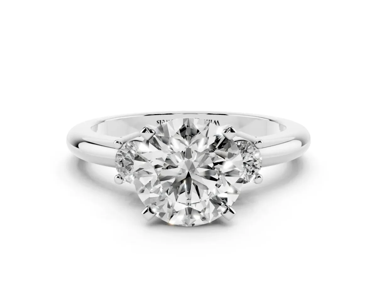 Three-Stone Round Cut Cut Diamond Solitaire with Prong Setting and Classic Band Silver