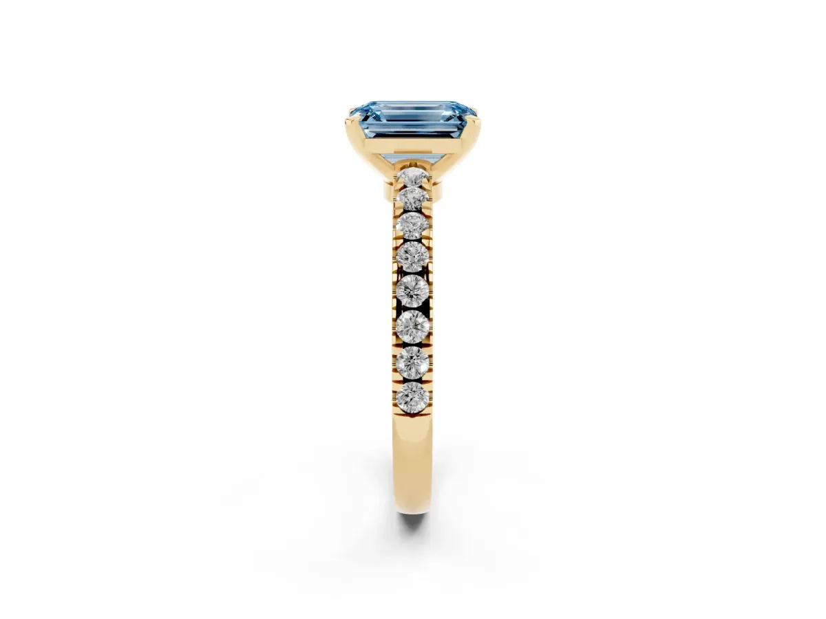 Fancy Blue Emerald Cut Solitaire Diamond with Pavé Band and Four-Prong Setting Yellow gold