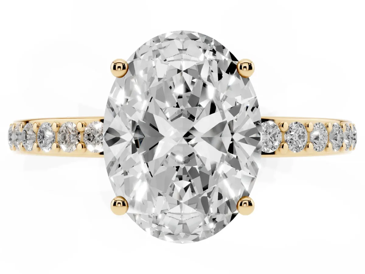 Oval Cut Cut Diamond Pavé Band Ring with Four-Prong Setting Yellow gold