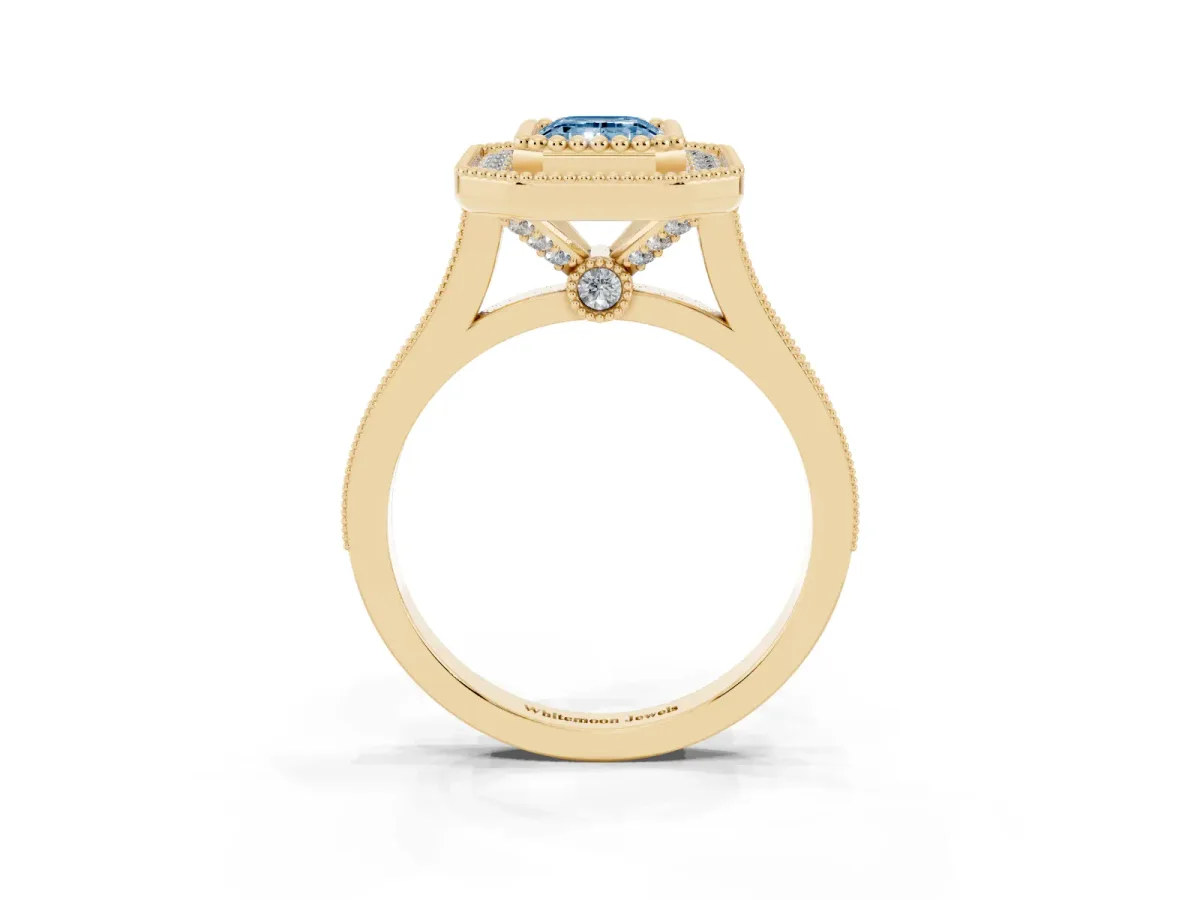 Fancy Blue Emerald Cut Diamond Halo Ring with Milgrain Frame and Pavé Band Yellow gold