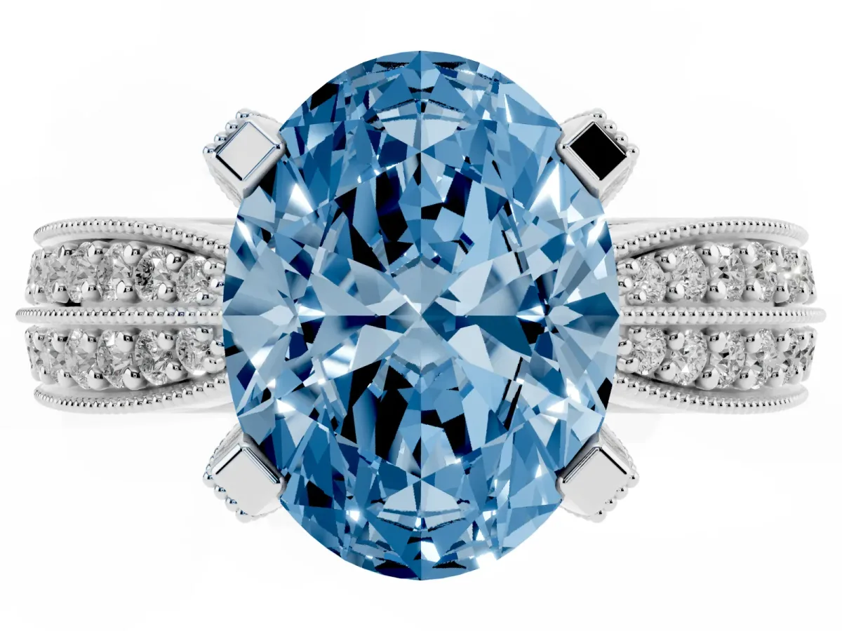 Fancy Blue Oval Cut Diamond Solitaire Ring with Milgrain Round Pavé Band and Prong Setting Silver