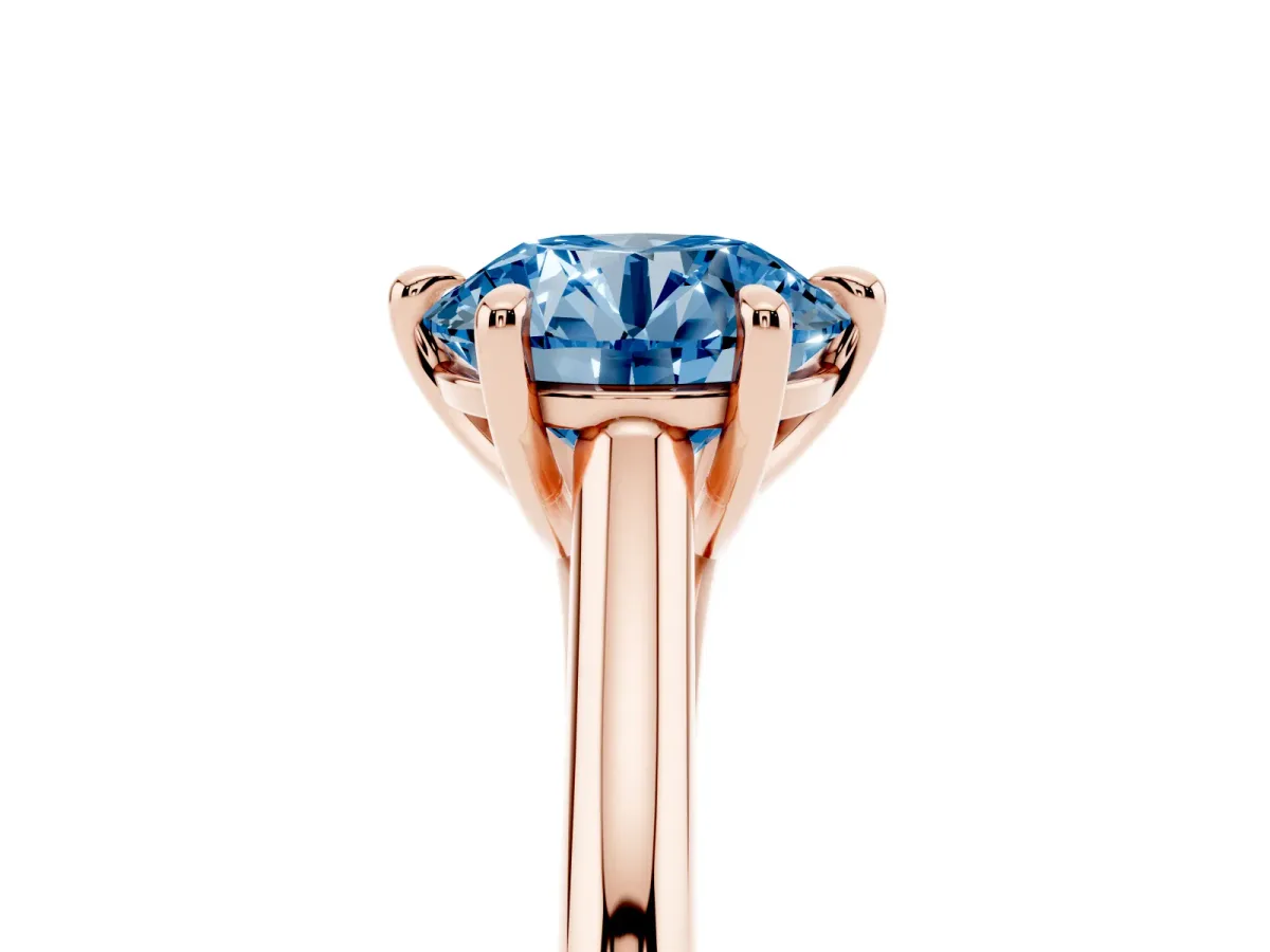 Fancy Blue Round Cut Solitaire Engagement Ring with Six-Prong Setting and Classic Band Rose gold