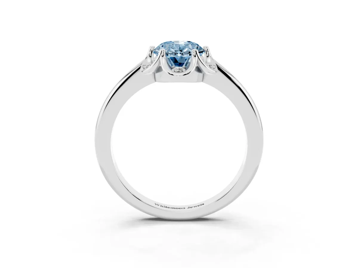 Fancy Blue Oval Cut Halo Diamond Ring with Round Cluster Setting, Solitaire Band, and Four-Prong Setting Silver