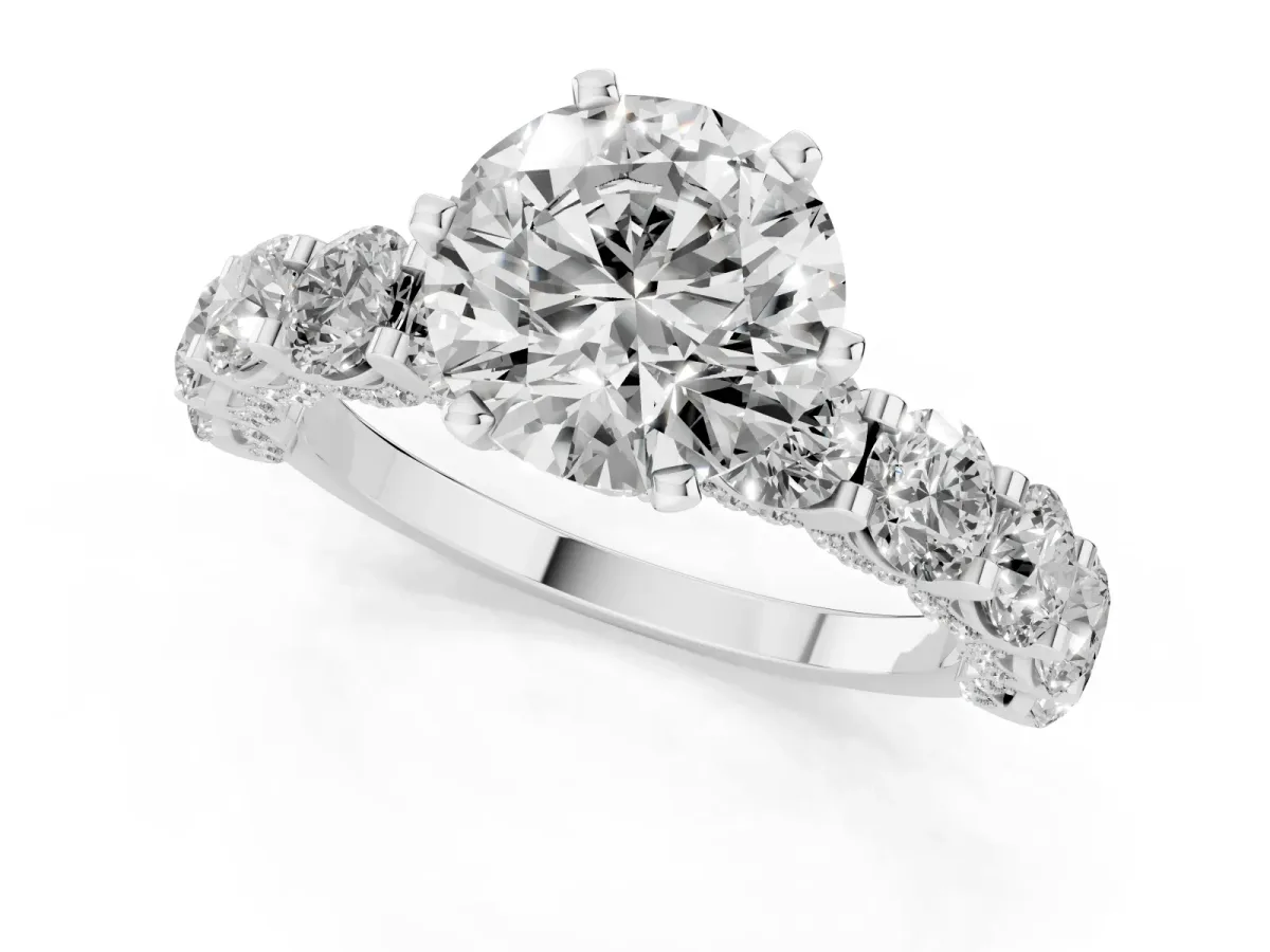 Round Cut Diamond Side Stone Engagement Ring with Four-Prong Setting Silver