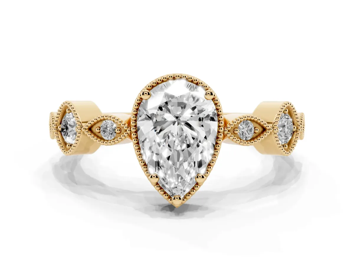 Pear Cut Diamond Vintage Milgrain Ring with Round Stations Yellow gold