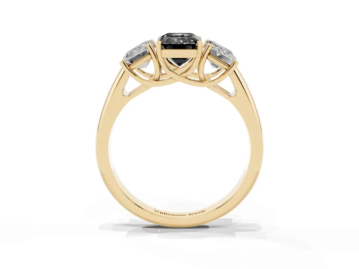 Fancy Black Three-Stone Emerald Cut Diamond Engagement Ring with Prong Setting Yellow gold