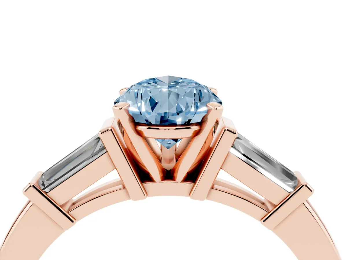 Fancy Blue Pear Cut Cut Diamond Solitaire Ring with Tapered Baguette Accents and Four-Prong Setting Rose gold
