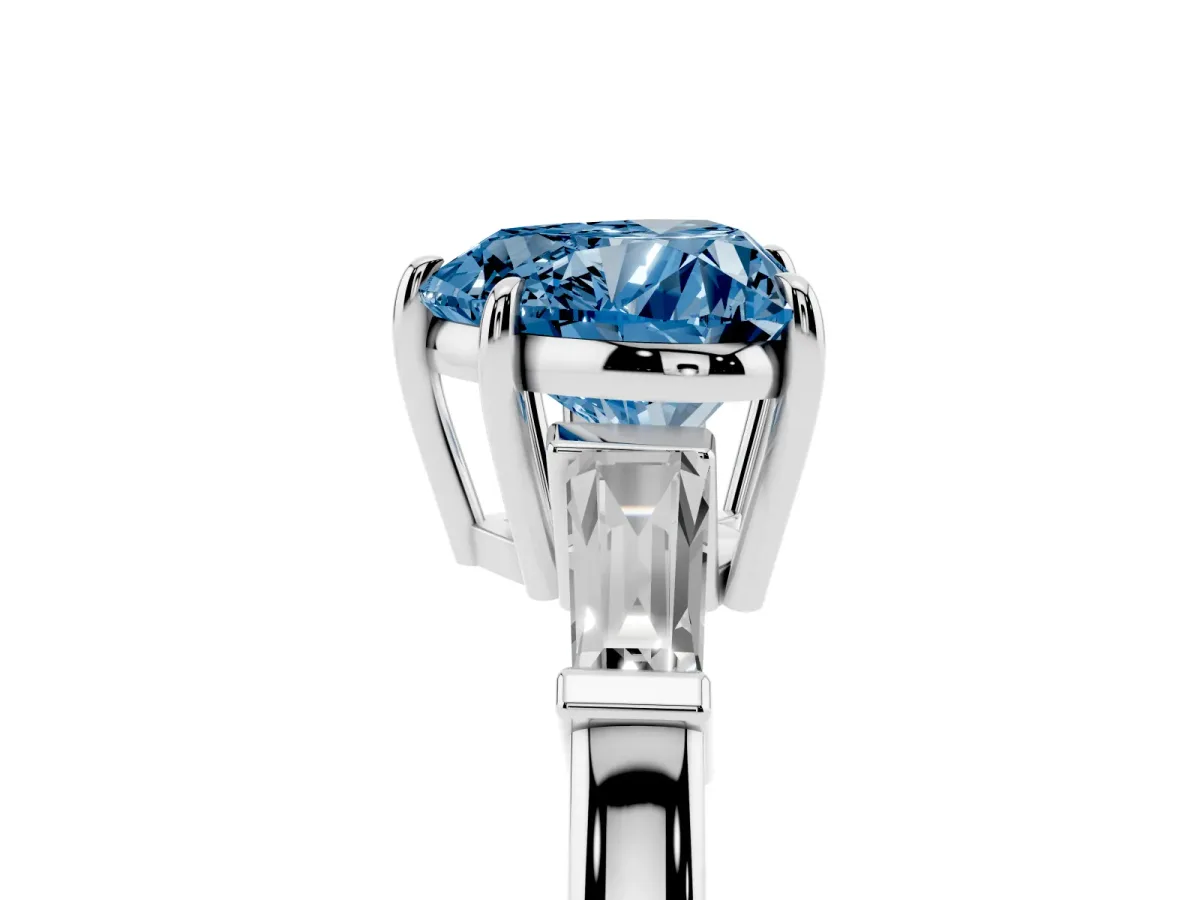 Fancy Blue Heart Cut Diamond Three-Stone Ring with Tapered Baguette Side Stones and Prong Setting Silver