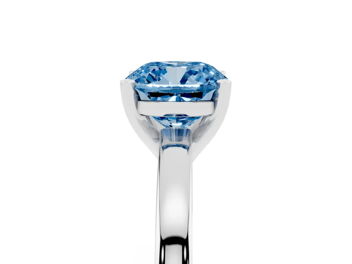 Fancy Blue Cushion Cut Solitaire Diamond Engagement Ring with Four-Prong Setting on a Classic Band Platinum