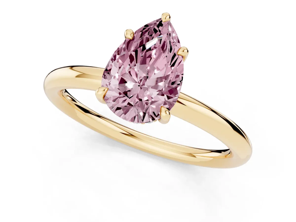 Fancy Pink Pear Cut Diamond Solitaire Ring with Thin Band and Four-Prong Setting Yellow gold