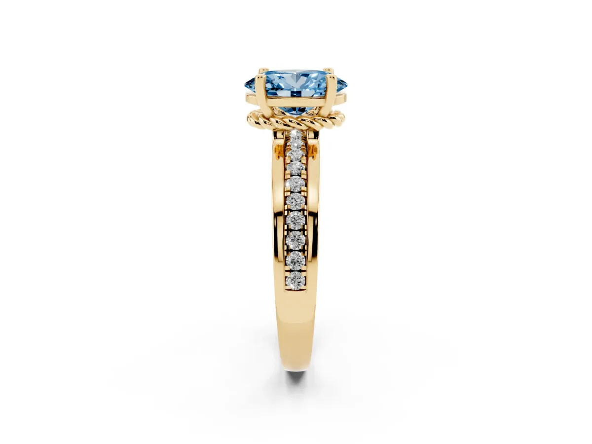 Fancy Blue Oval Cut Solitaire Diamond Ring with Channel Set Band and Six-Prong Setting Yellow gold