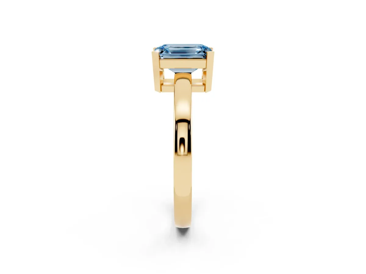 Fancy Blue Emerald Cut Cut Solitaire Ring with Four-Prong Setting and Classic Band Yellow gold