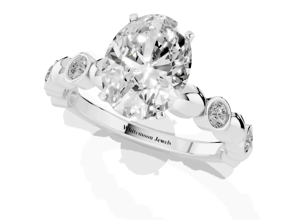 Oval Cut Solitaire Bezel-Set Diamond Ring with Beaded Band and Four-Prong Setting Platinum