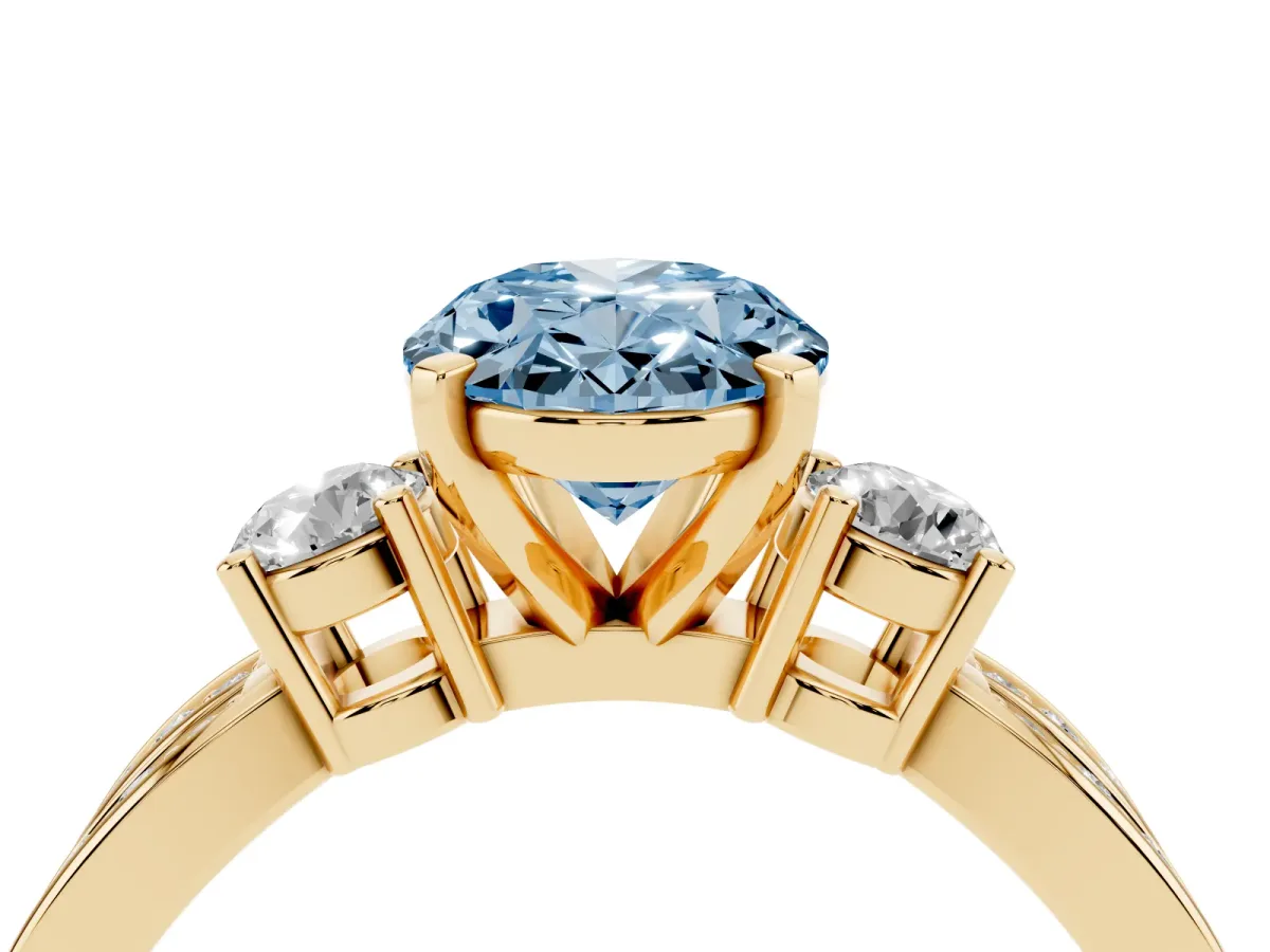 Fancy Blue Three-Stone Oval Cut Cut Diamond Twist Band with Prong Setting Yellow gold