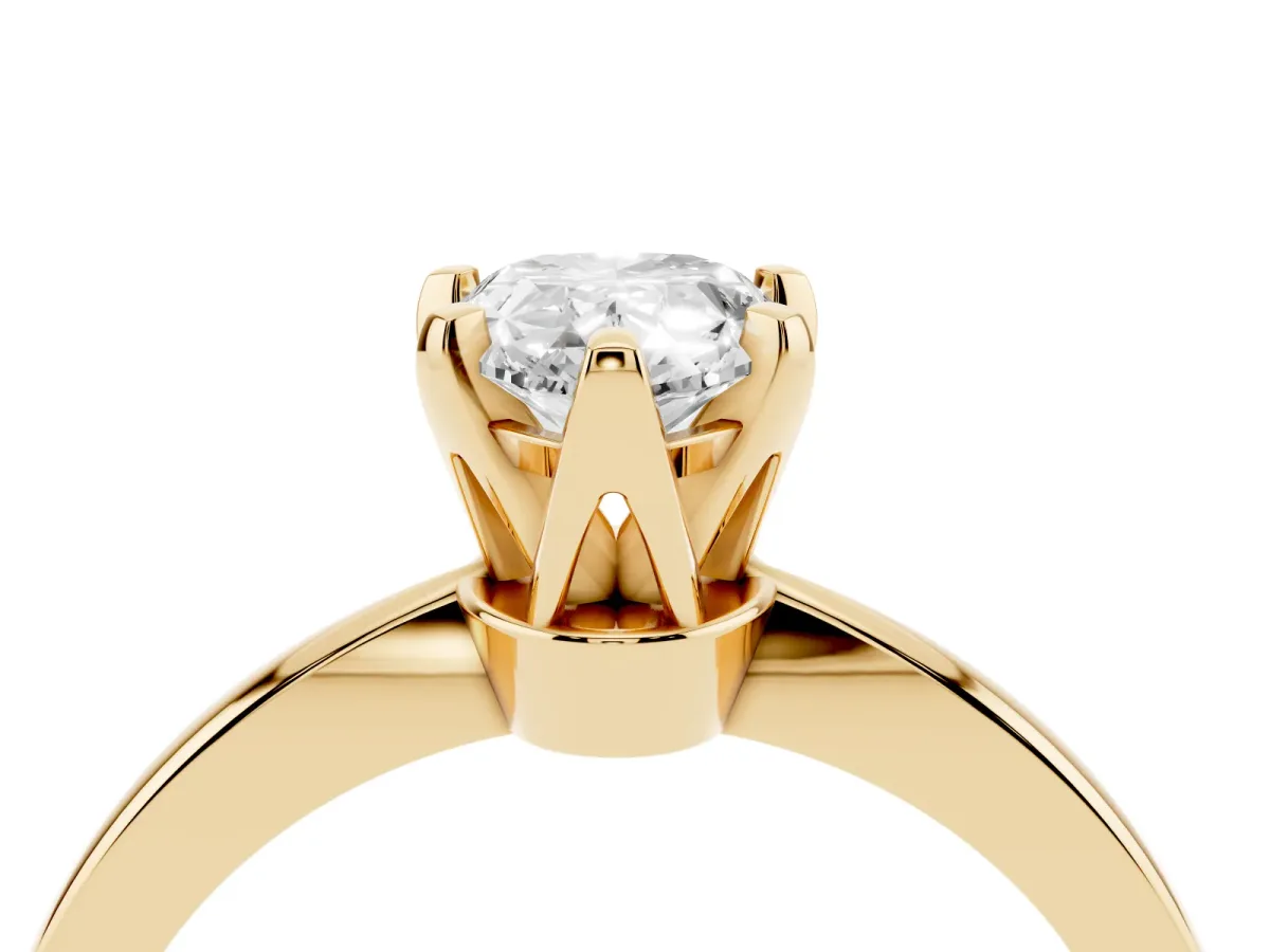 Pear Cut Solitaire Engagement Ring with Six-Prong Setting and Tapered Band Yellow gold