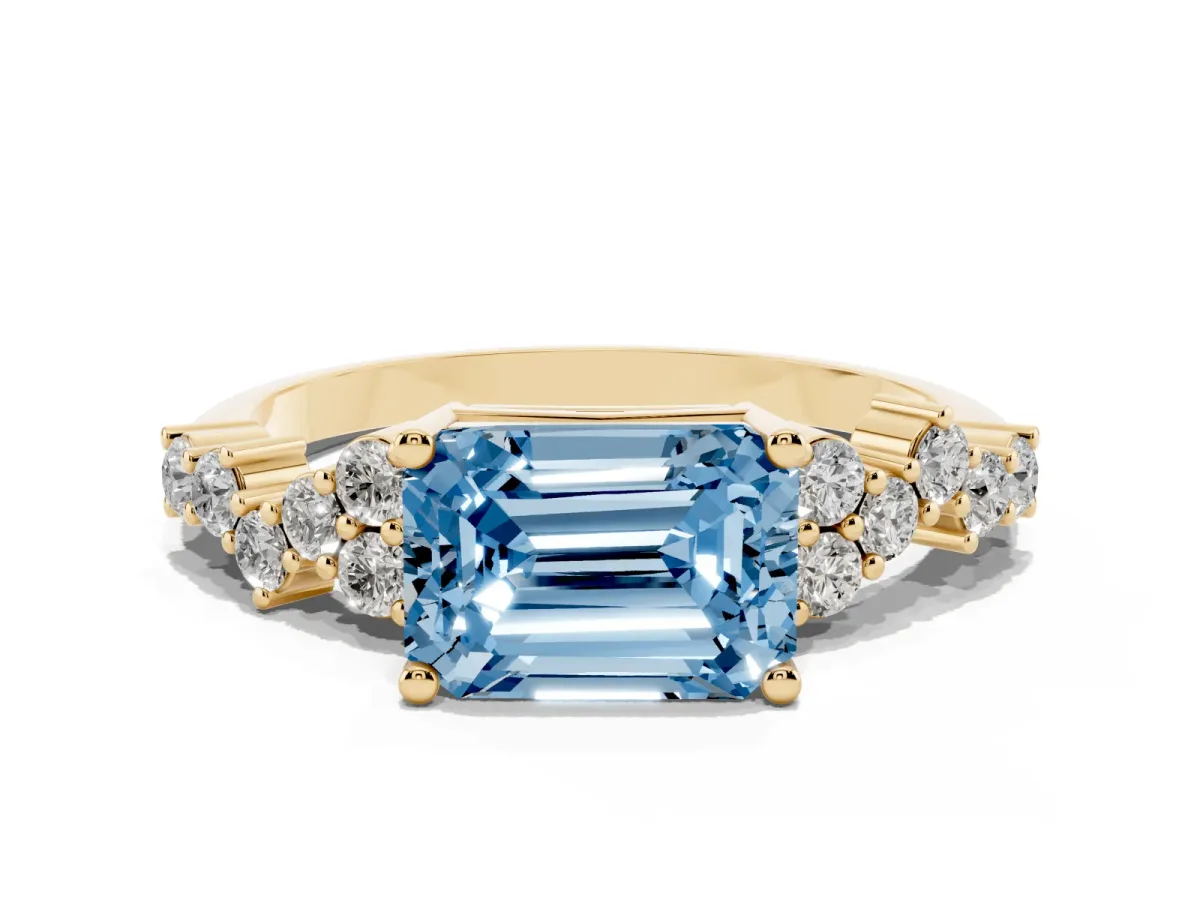Fancy Blue Emerald Cut Diamond Scattered Round Accent Ring with Prong Setting Yellow gold