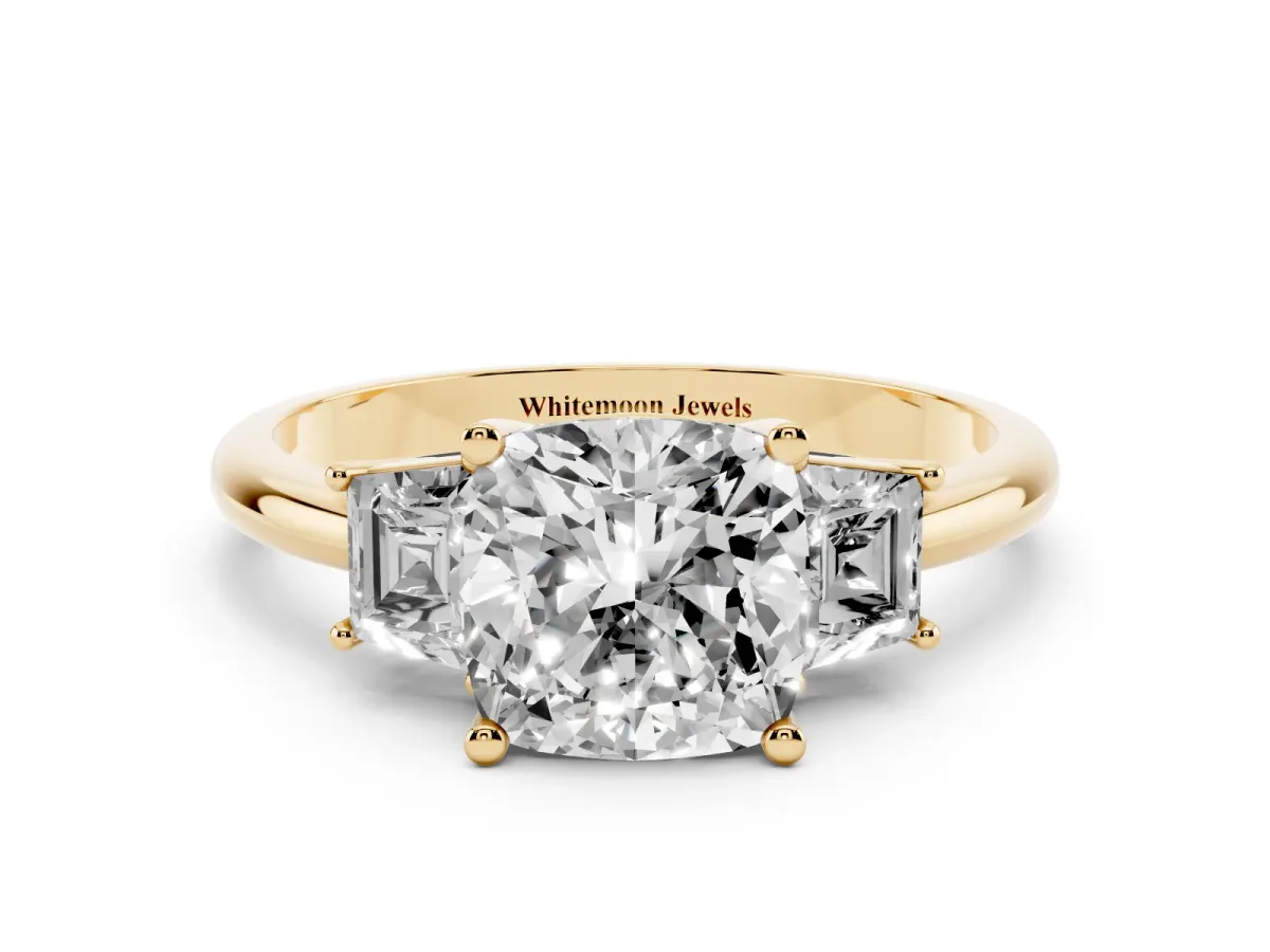 Cushion Cut Diamond Three-Stone Ring with Trapezoid Side Stones and Prong Setting Yellow gold