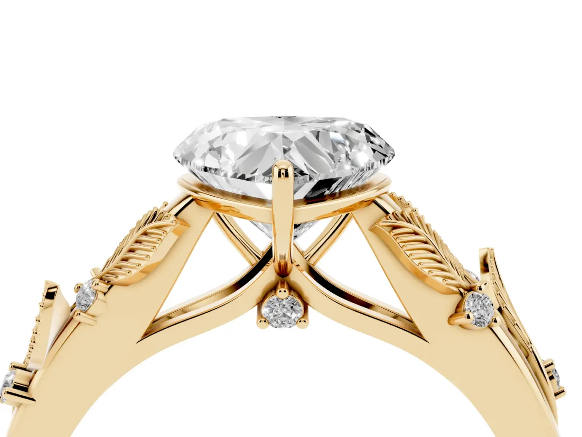 Heart Cut Diamond Solitaire Ring with Leaf Motif Band and Four-Prong Setting Yellow gold