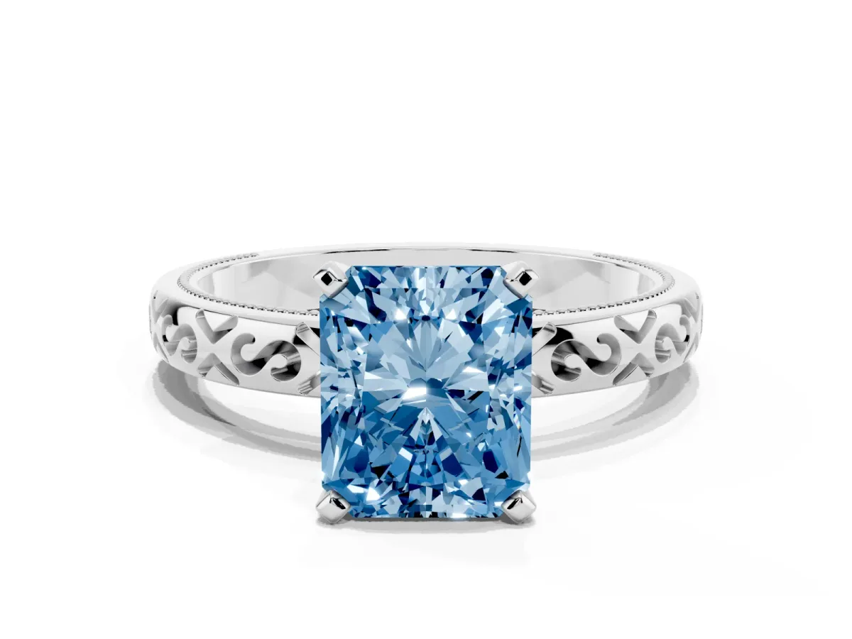 Fancy Blue Radiant Cut Solitaire Engagement Ring with Scrollwork Band and Four-Prong Setting Silver