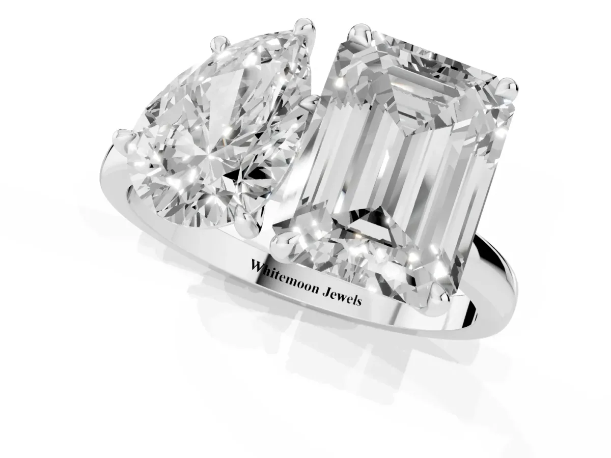 Pear Cut and Emerald Cut Toi Moi Ring with Prong Setting Platinum