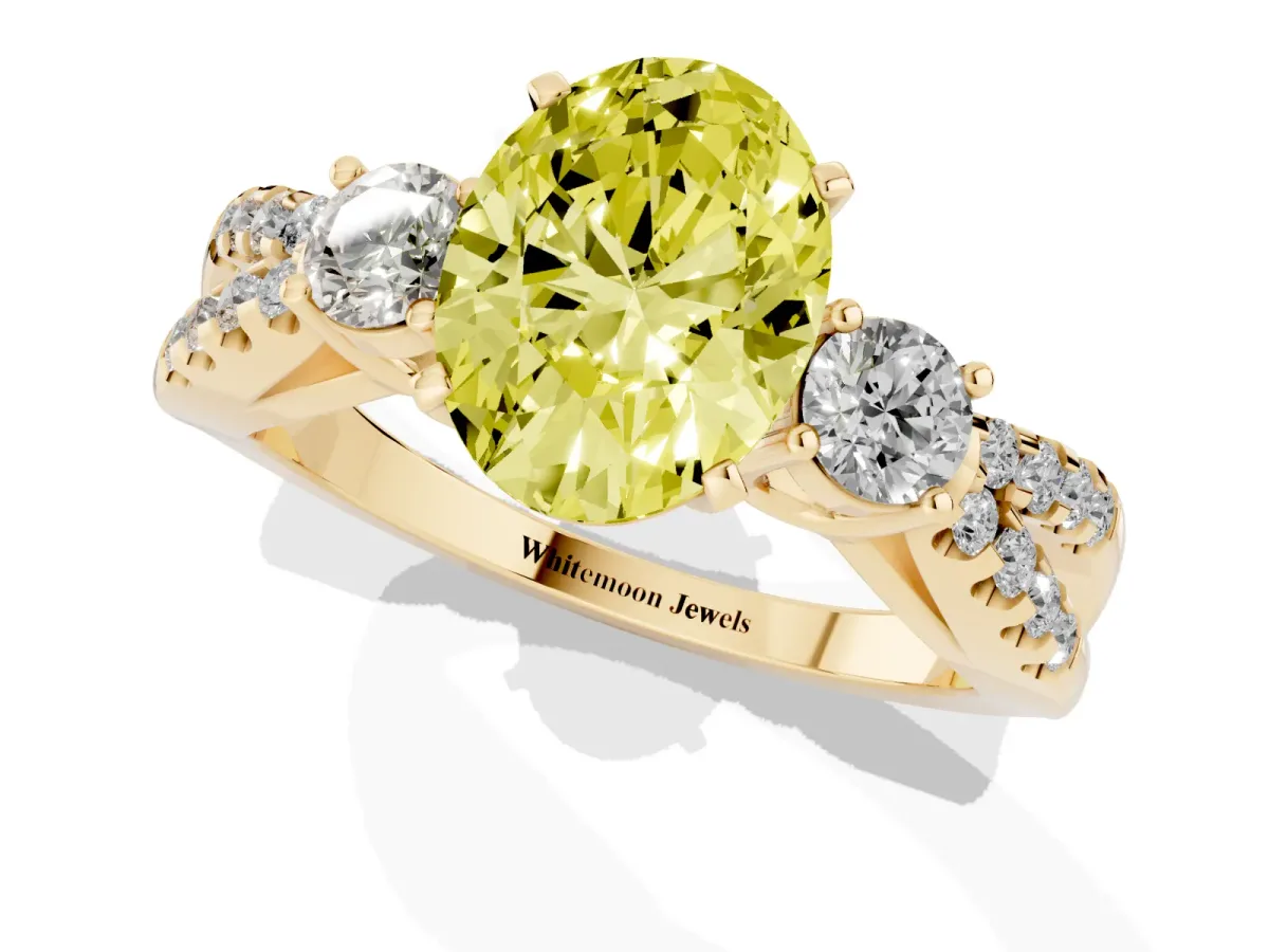 Fancy Yellow Oval Cut Diamond Three-Stone Ring with Pavé Split Shank and Four-Prong Setting Yellow gold