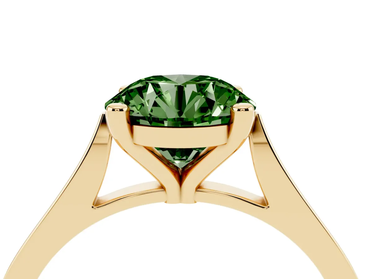 Fancy Green Round Cut Solitaire Diamond Ring with Four-Prong Setting and Tapered Band Yellow gold