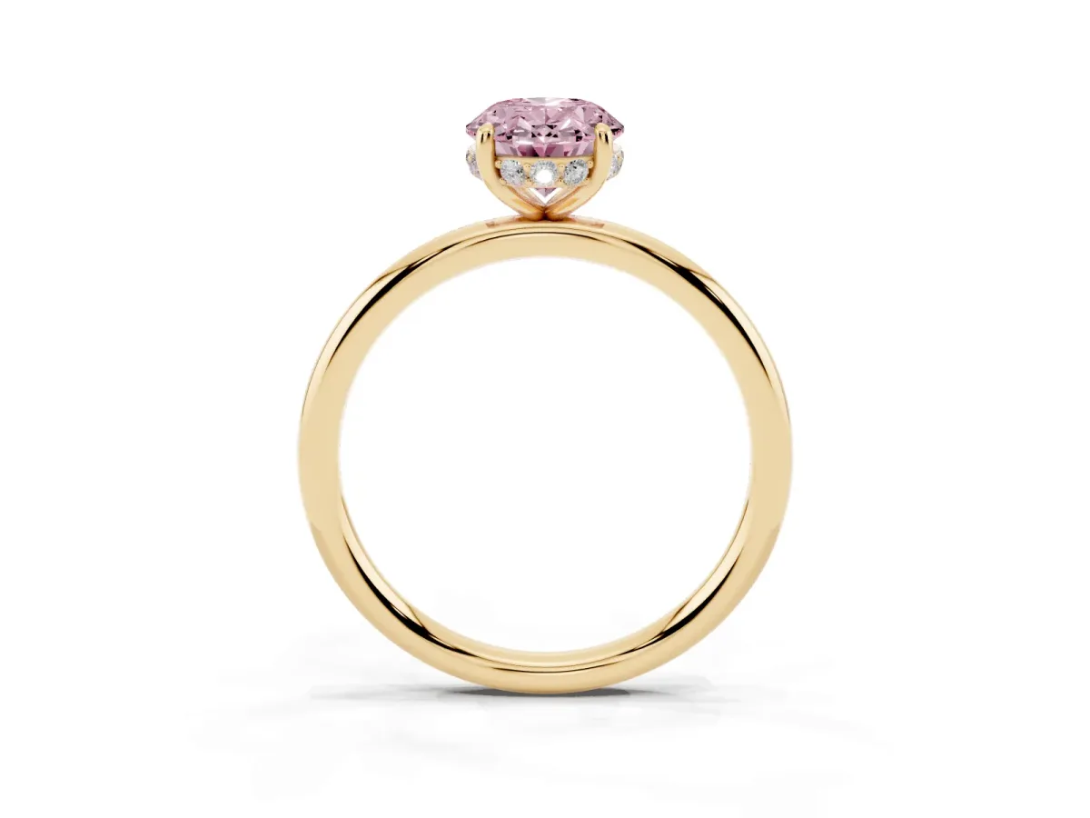 Fancy Pink Oval Cut Solitaire Diamond Ring with a Classic Band and Four-Prong Setting Yellow gold