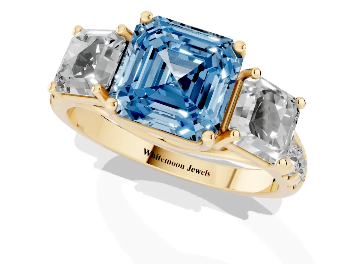 Fancy Blue Three-Stone Asscher Cut Diamond Pavé Band with Prong Setting Yellow gold