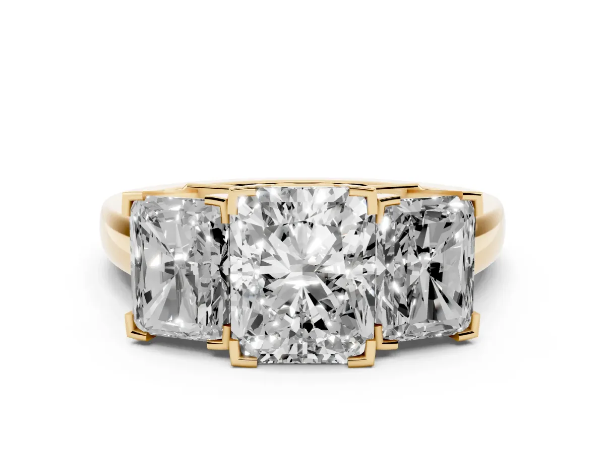 Three-Stone Radiant Cut Cut Diamond Ring with Channel Set Band and Four-Prong Setting Yellow gold