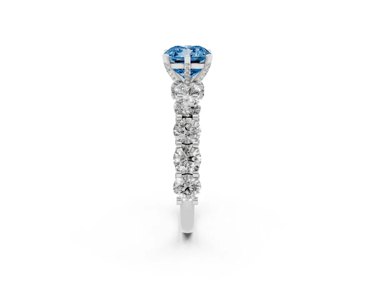 Fancy Blue Cushion Cut Diamond Side Stone Engagement Ring with Four-Prong Setting Platinum