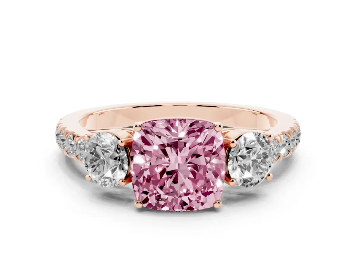 Fancy Pink Cushion Cut Cut Diamond Three-Stone Ring with Round Side Stones and Pavé Band Rose gold