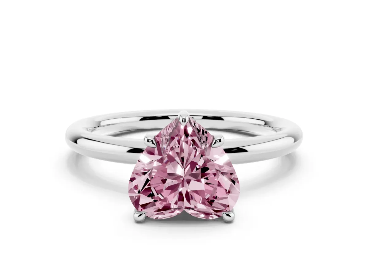 Fancy Pink Heart Cut Diamond Solitaire Ring with Thin Band and Four-Prong Setting Platinum
