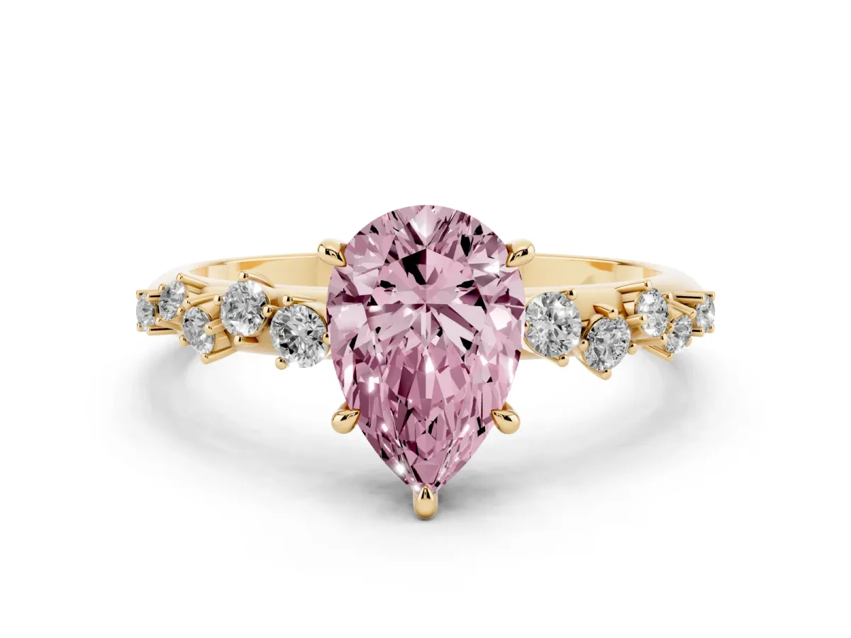 Fancy Pink Pear Cut Diamond Cluster Side Stone Solitaire Ring with Prong Setting Yellow gold