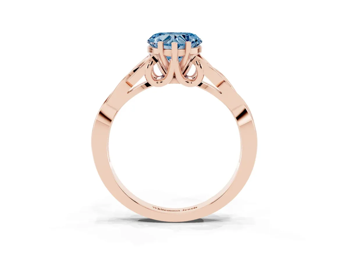 Fancy Blue Heart Cut Diamond Solitaire Engagement Ring with Celtic Knot Band and Four-Prong Setting Rose gold