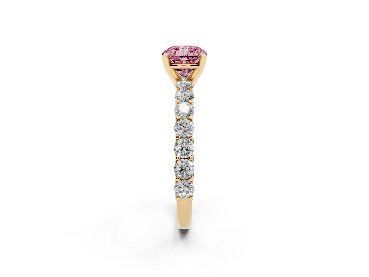 Fancy Pink Cushion Cut Diamond Solitaire Ring with Shared Prong Pavé Band and Four-Prong Setting Yellow gold