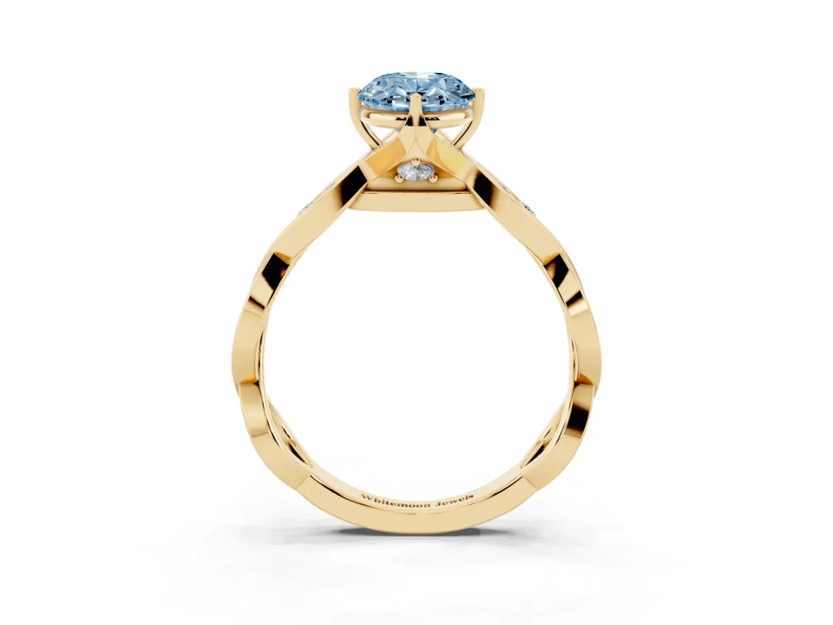 Fancy Blue Oval Cut Solitaire Twist Band with Leaf Prong Setting Yellow gold