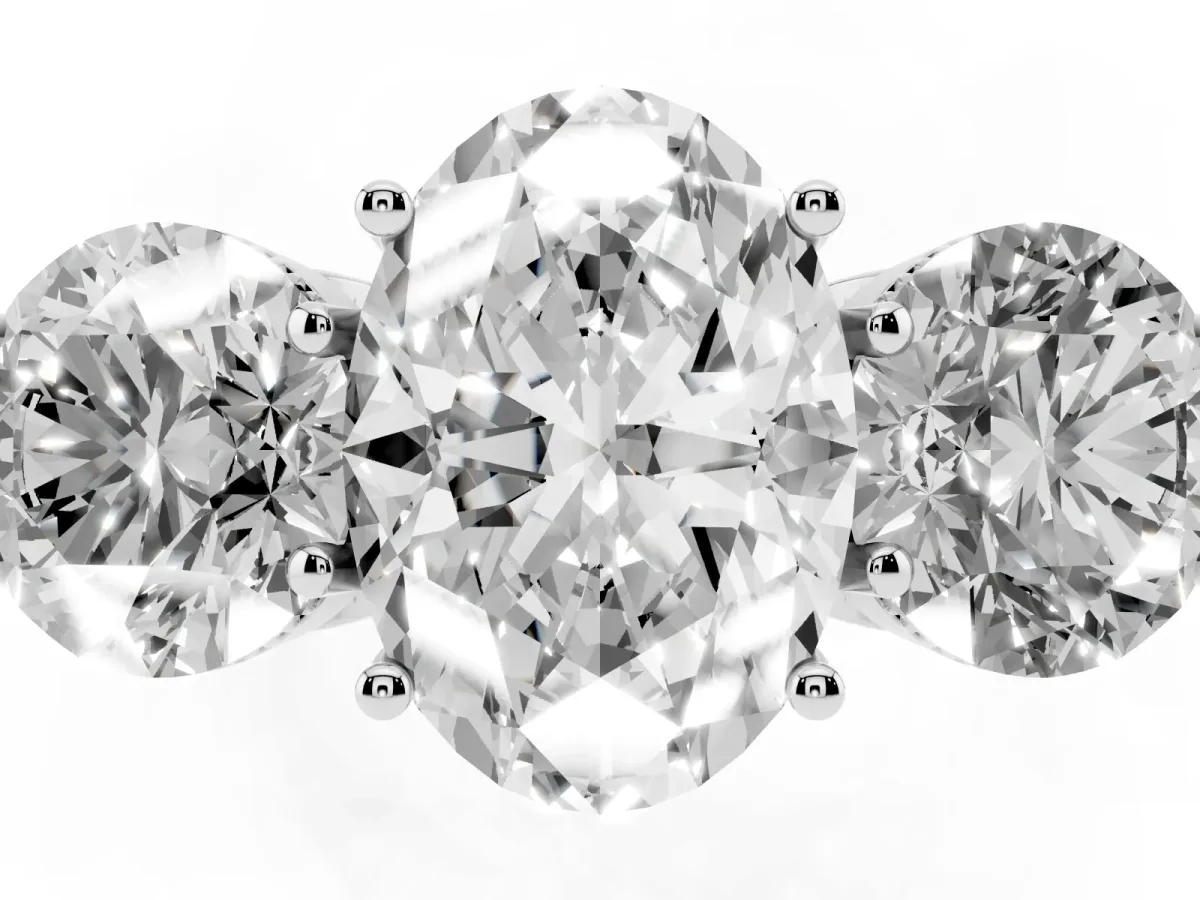 Three-Stone Oval Cut Diamond Engagement Ring with Prong Setting on a Classic Band Silver