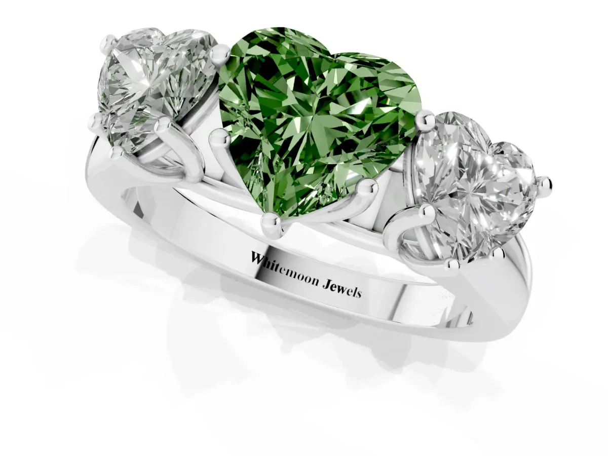 Fancy Green Heart Cut Three-Stone Diamond Ring with Prong Setting on a Classic Band Silver