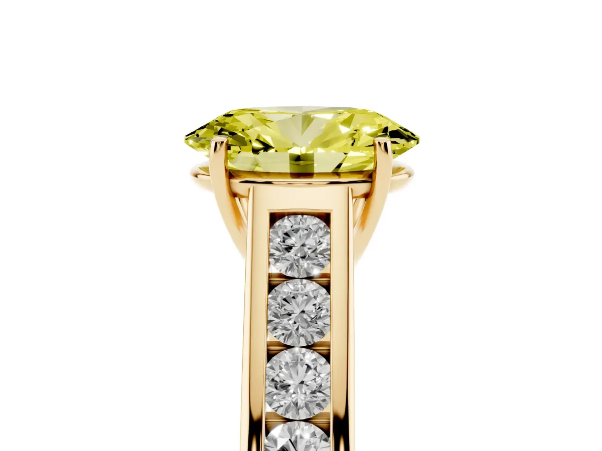Fancy Yellow Oval Cut Brilliant Channel-Set Solitaire Ring with Four-Prong Setting Yellow gold