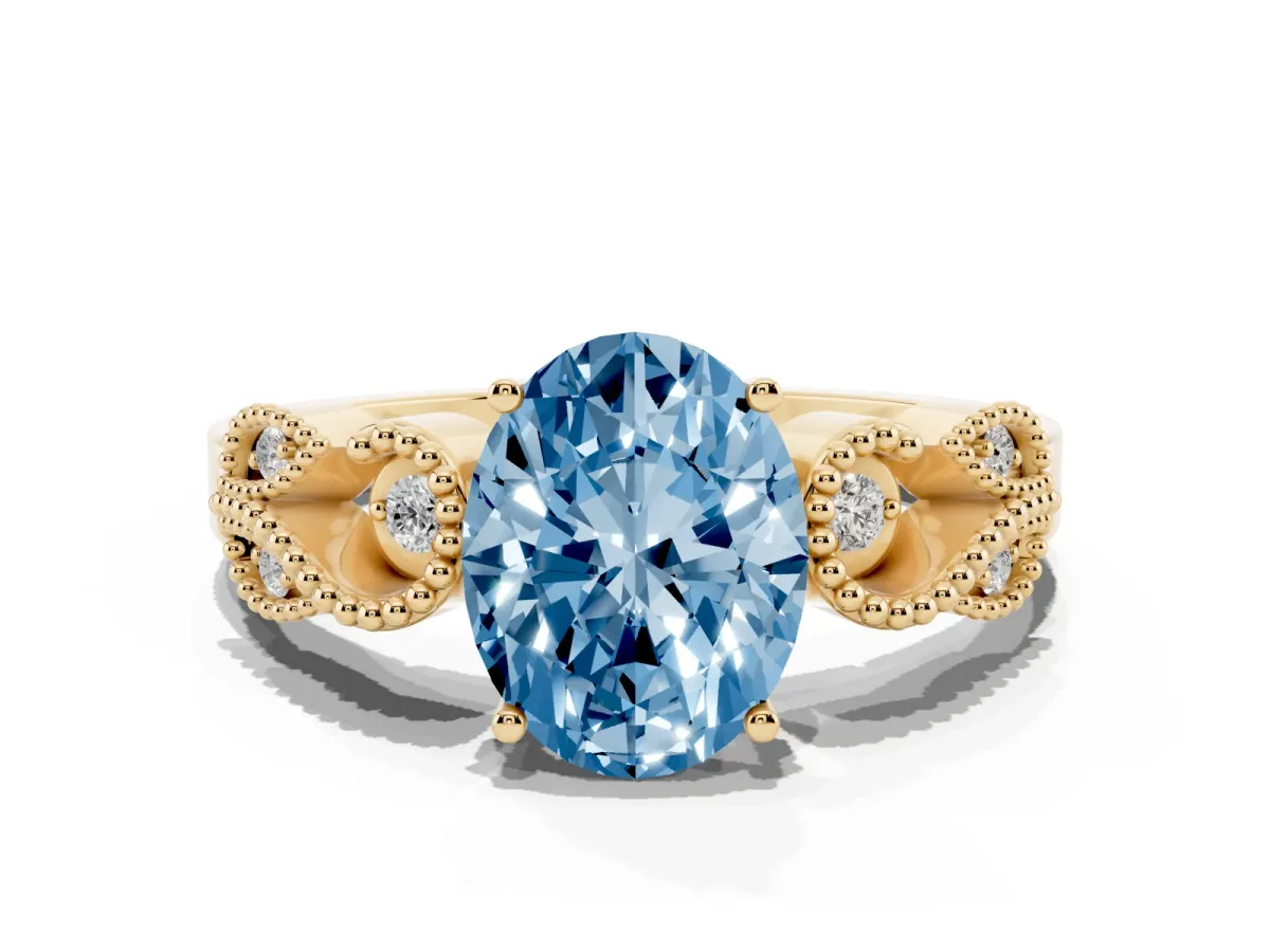 Fancy Blue Oval Cut Solitaire Milgrain Leaf Band with Prong Setting Yellow gold