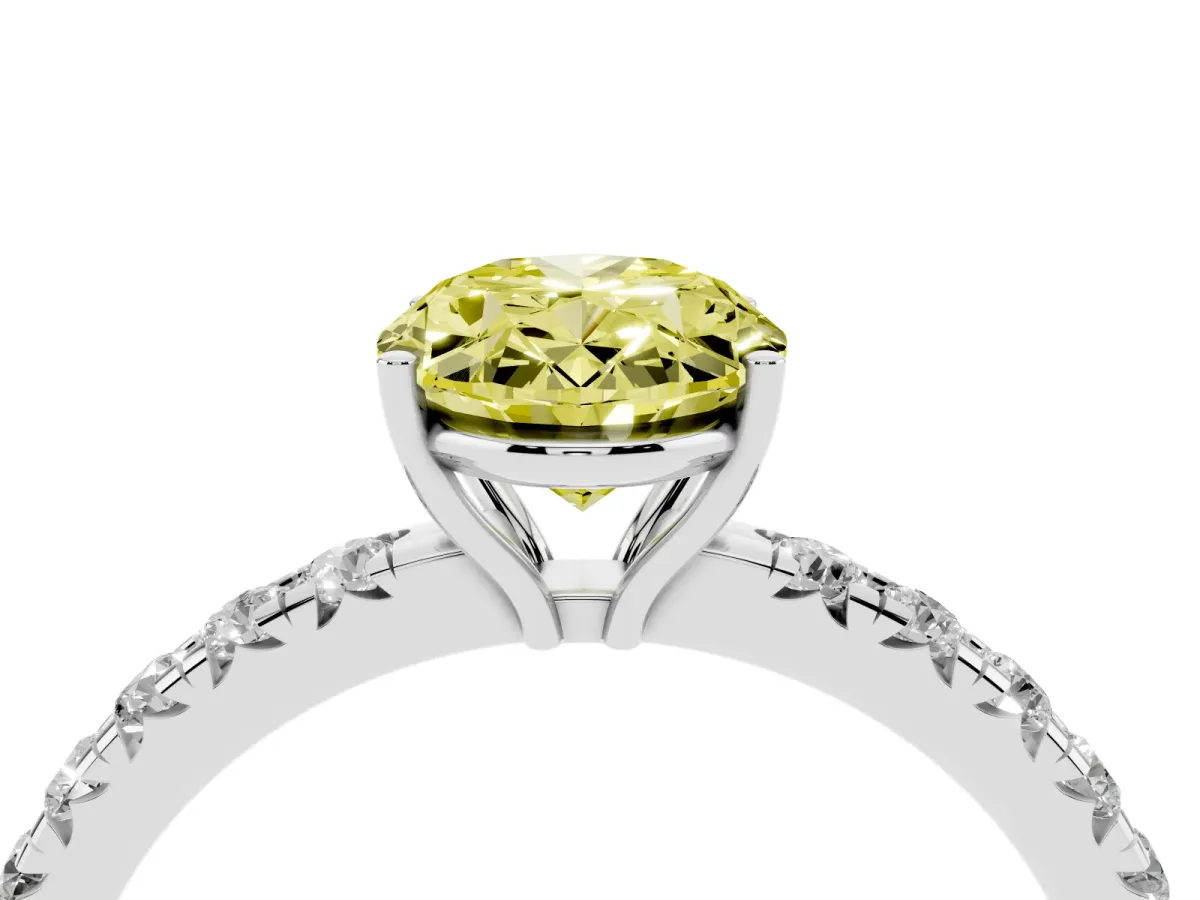 Fancy Yellow Oval Cut Diamond Pavé Solitaire Engagement Ring with Four-Prong Setting Platinum